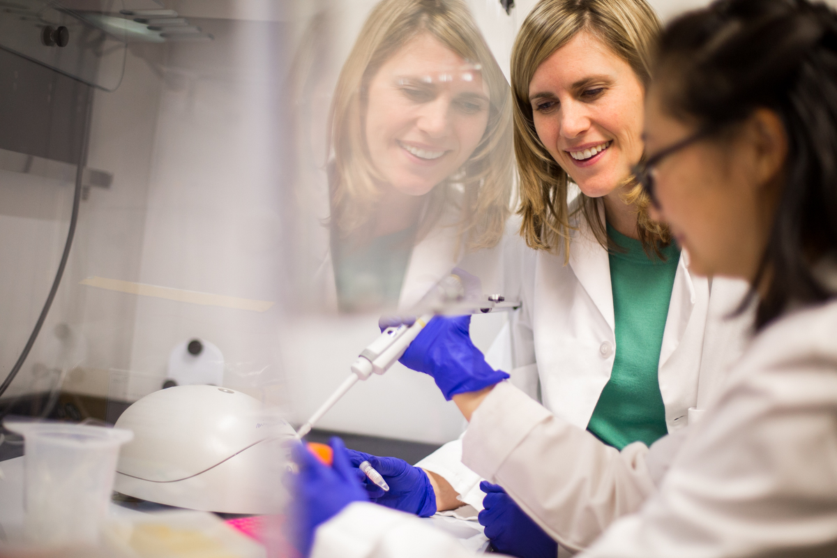 sarah johnson working in lab with student