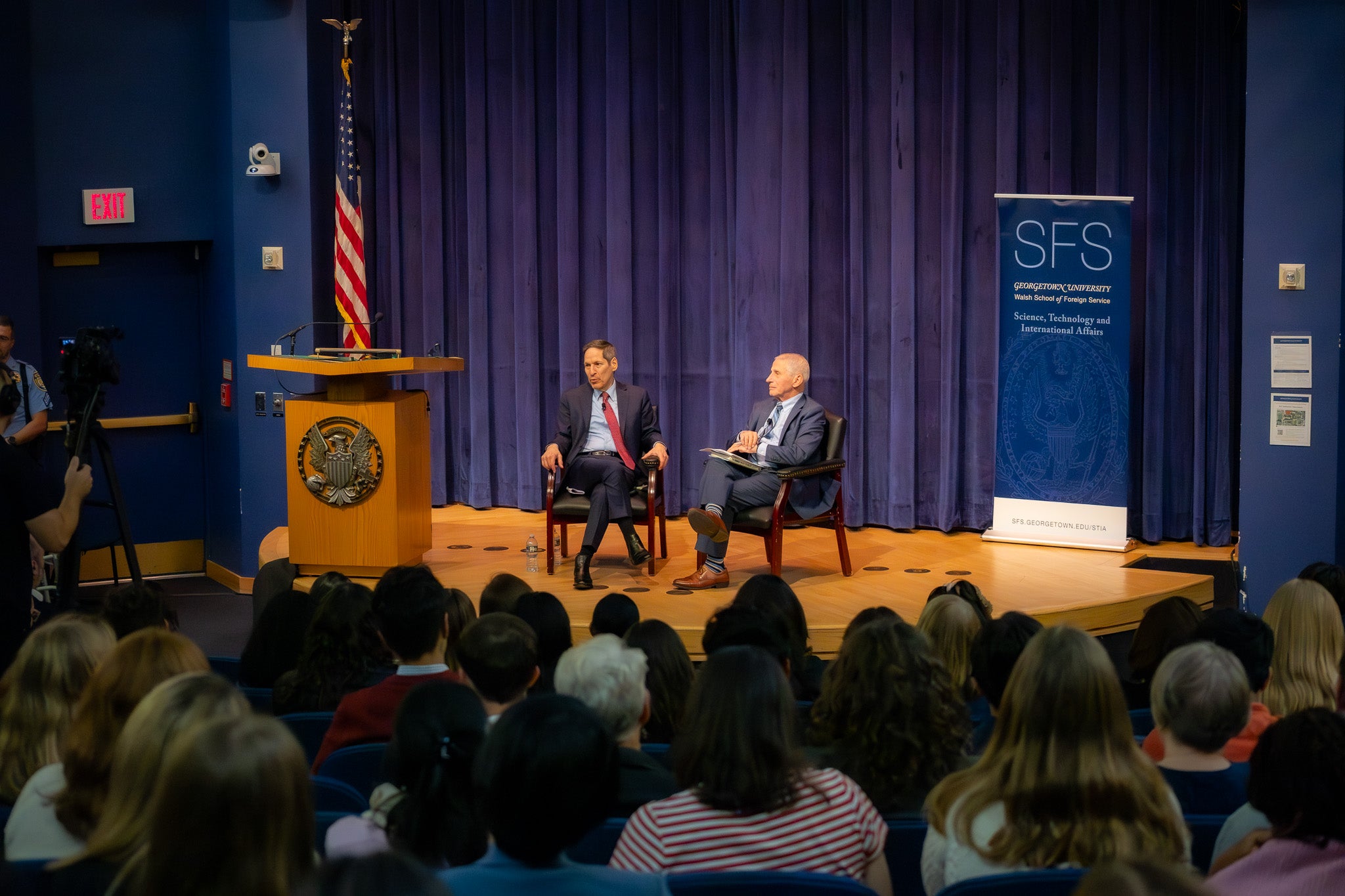 Dr. Fauci and Dr. Frieden on stage for a STIA event
