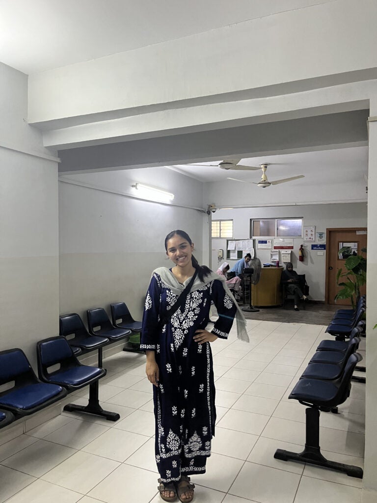Amara in hospital hallway